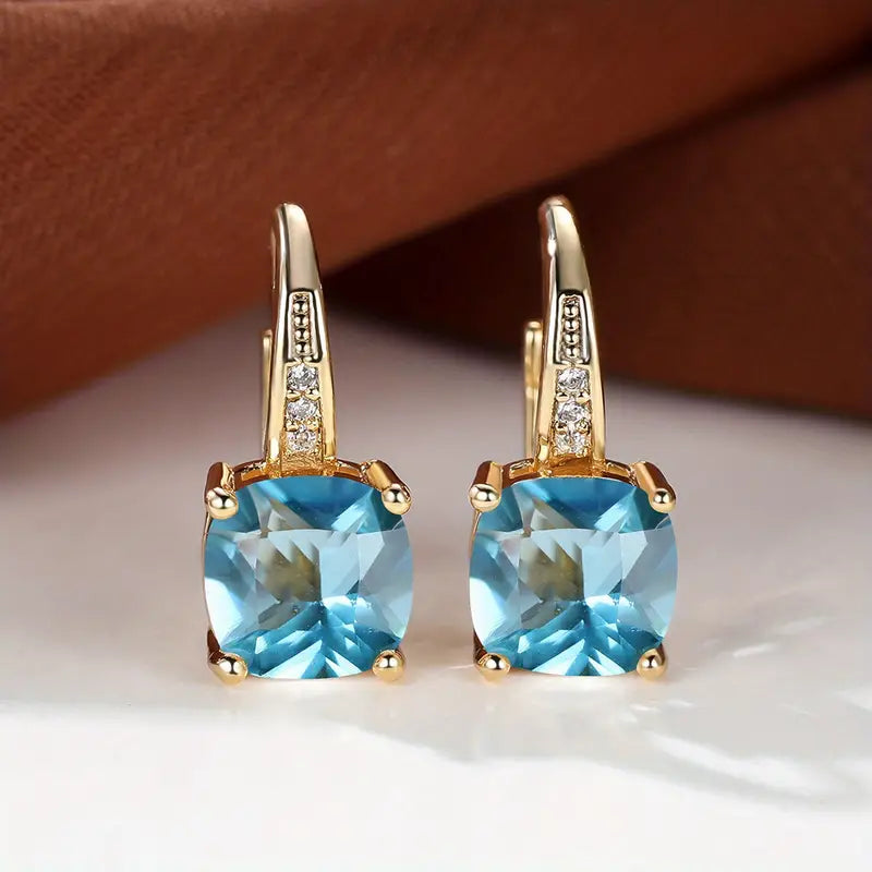 Elegante mystische Steine Gold Creolen