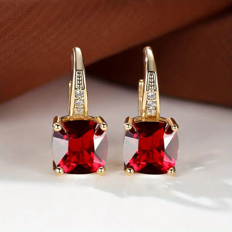 Elegante mystische Steine Gold Creolen