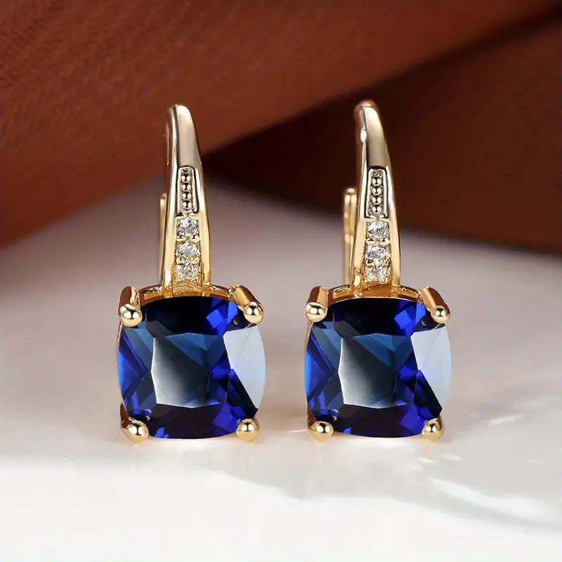 Elegante mystische Steine Gold Creolen