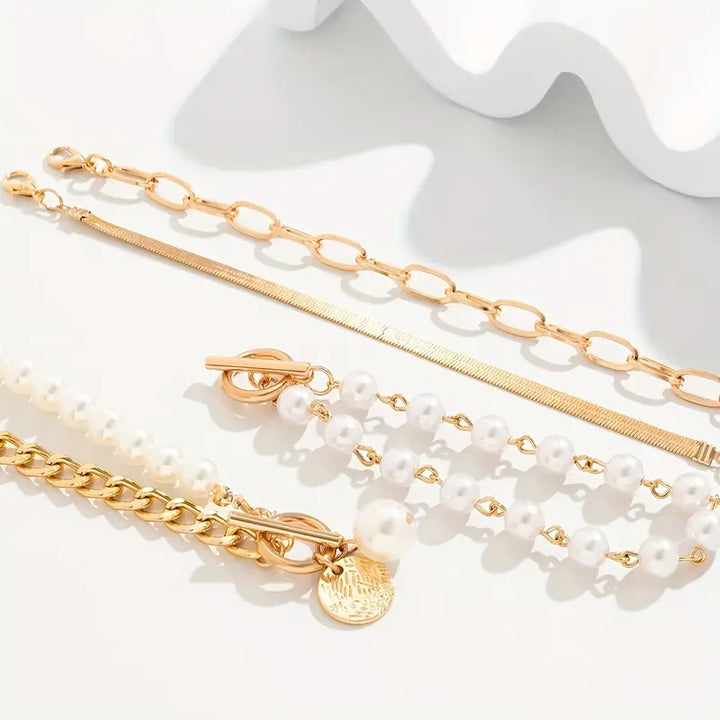 Elegantes 4-teiliges Goldarmband-Set – Schlange, Perlen und Glieder
