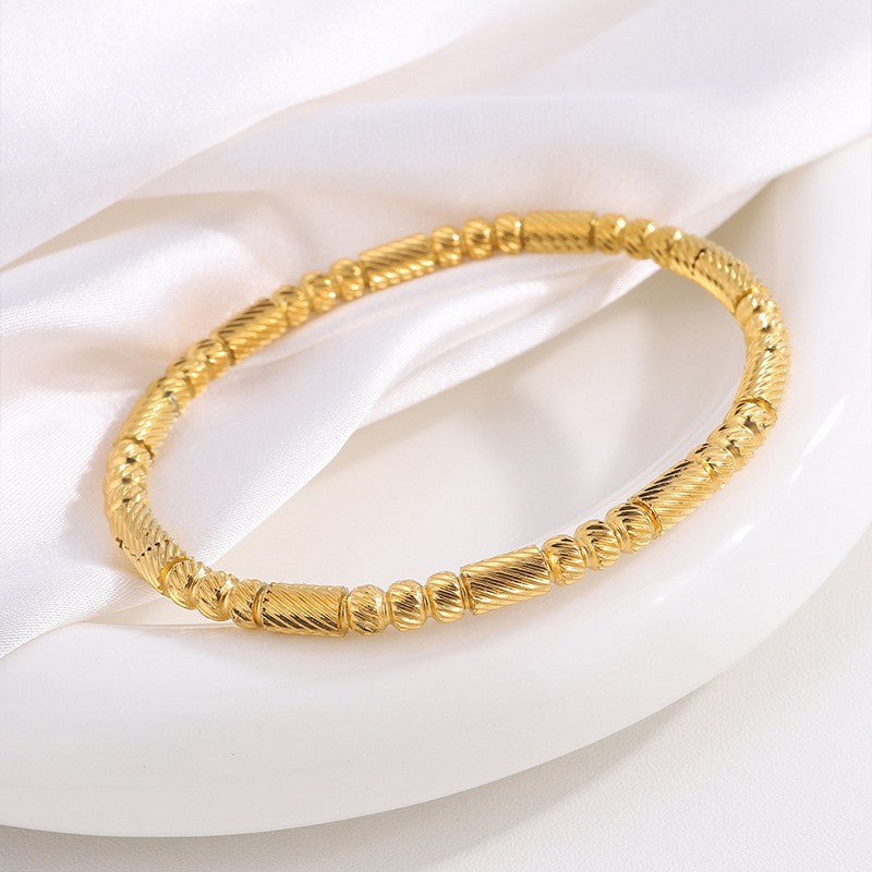 Elegantes goldenes Isavetta Bruni Armband