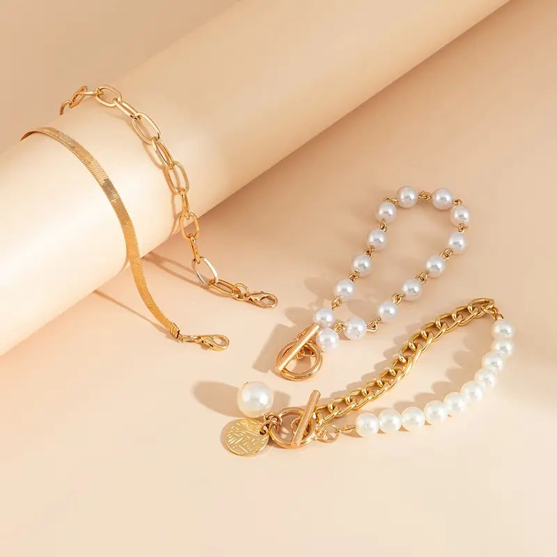 Elegantes 4-teiliges Goldarmband-Set – Schlange, Perlen und Glieder