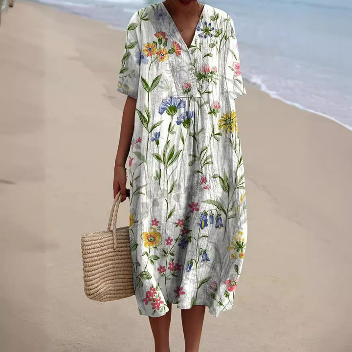 Damen Elegantes Sommerkleid mit Blütenmuster in Weiß