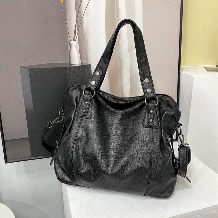 Damen Große Leder-Look Shopper-Tasche mit Nieten in Schwarz