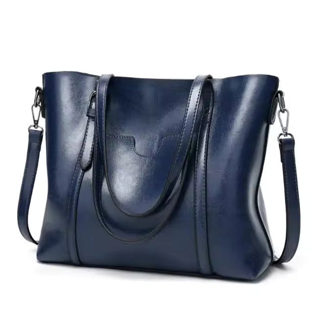 Damen große Leder-Look Tragetasche mit verstellbarem Riemen in Blau