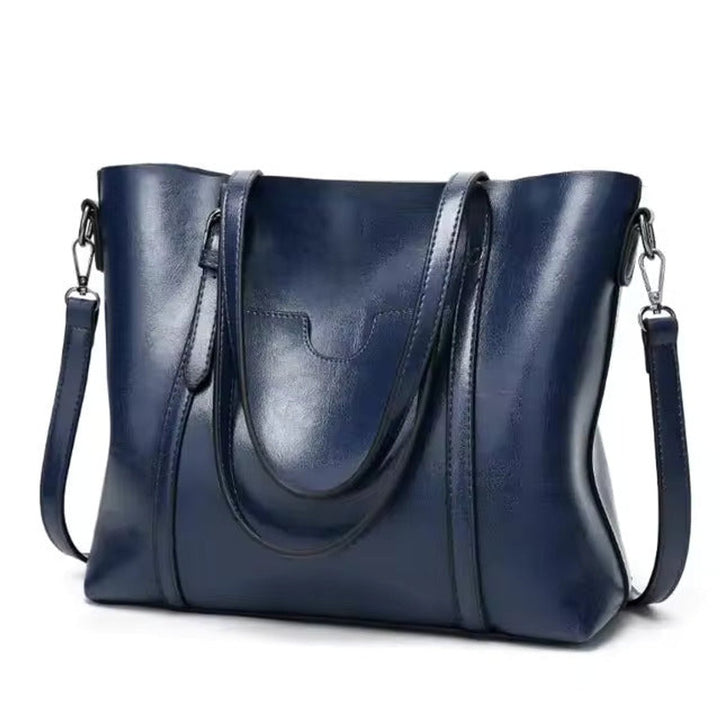 Damen große Leder-Look Tragetasche mit verstellbarem Riemen in Blau