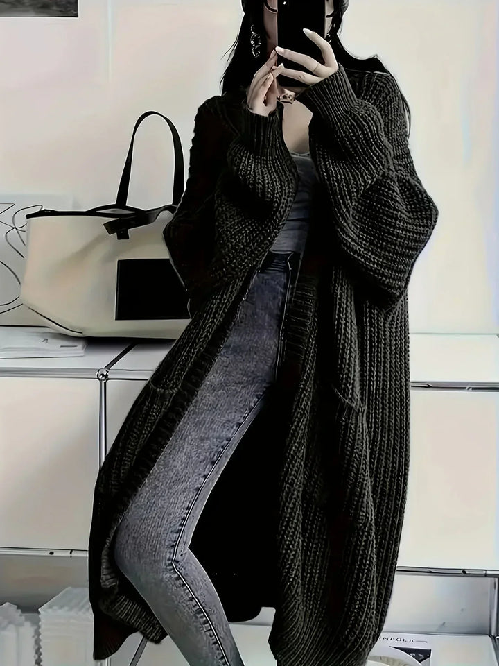 Damen lange Oversized-Strickjacke für den Herbst in Schwarz
