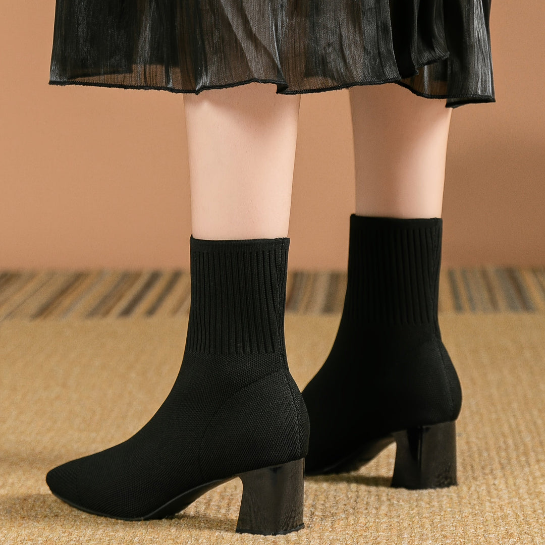 Damen Stiefeletten mit elastischem Strickschaft und Blockabsatz in Schwarz