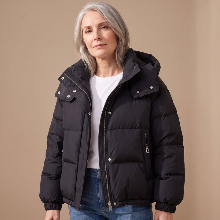 Damen Winterjacke mit Kapuze für Reisen in Schwarz