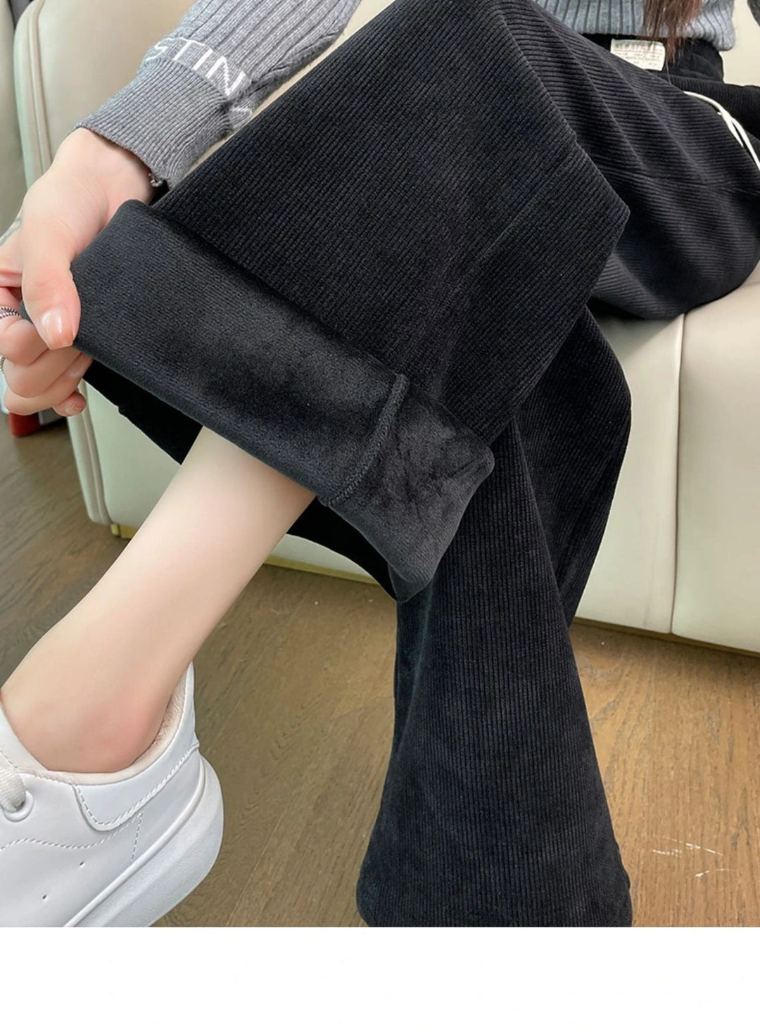 Herren Cargohose mit breitem Schnitt und Taschen in Schwarz gefüttert mit Taschen
