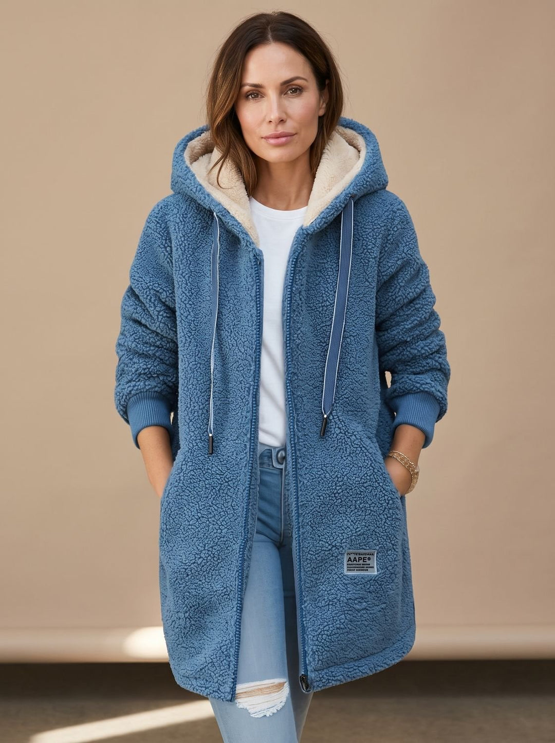 Kuschelige Damen Winterjacke mit Kapuze und Taschen in Blau