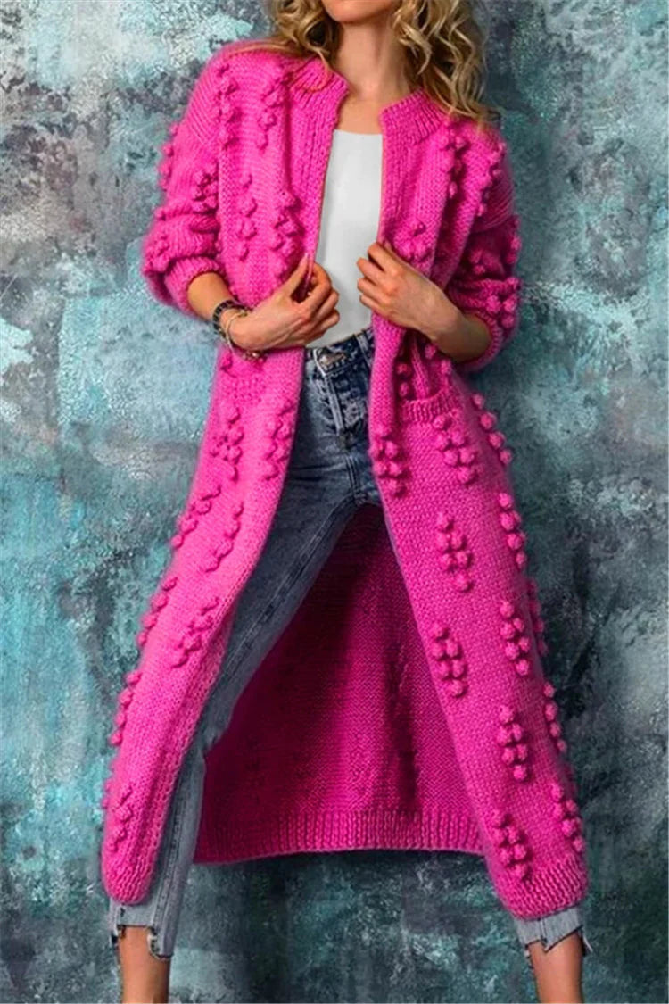 Lange Damen Strickjacke im Norweger-Stil mit Pompons in Rosa
