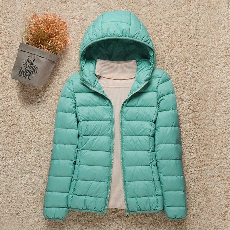 Ultraleichte Jacke für Winterreisen in Türkis