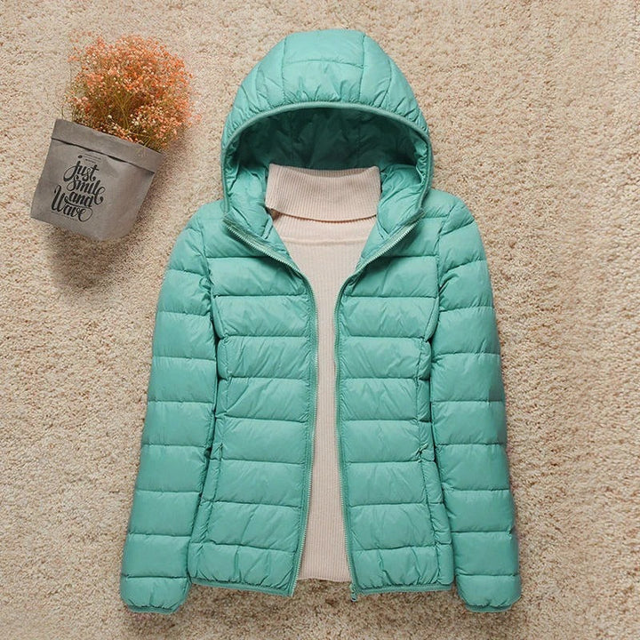 Ultraleichte Jacke für Winterreisen in Türkis