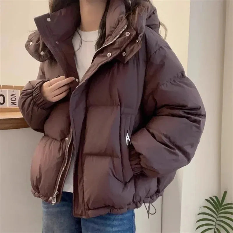 Warme Damen Winterjacke mit Kapuze in Braun